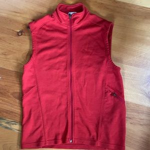 Lightly worn ibex lightweight merino wool zip front vest. Size L
